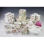 A large collection of Royal Albert Lavender Rose dinner and tea wares, comprising: two cake stands,