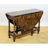 An 18th century oak gate leg table, of small proportions,