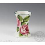 A Wemyss vase, of flared form painted with roses, painted and impressed marks to underside,