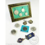 A selection of watches, coins and medallions, to include; a silver cased ladies fob watch,