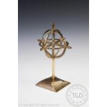 A Hygeia Studios three dimensional cross designed by Theo Gimbel in bronze,