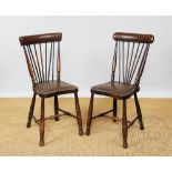 A pair of Edwardian spindle back bedroom chairs of small proportions, with padded seats,