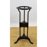 A George III style mahogany wig stand, early 20th century, with circular top and drawer,