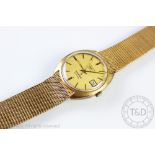 A gents Longines Automatic Admiral wristwatch, the yellow metal case with circular dial,