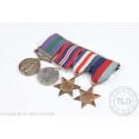 A World War II medal group of four to 14418161 Pte T.W.