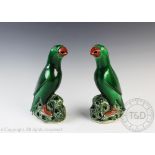 A pair of Chinese export porcelain parrots,