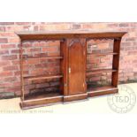 An 18th century style oak plate rack with central cupboard door with open shelves 108cm H x 172cm W