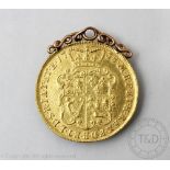 A George II gold two Guinea coin dated 1738, with soldered pendant mount, gross weight 17.