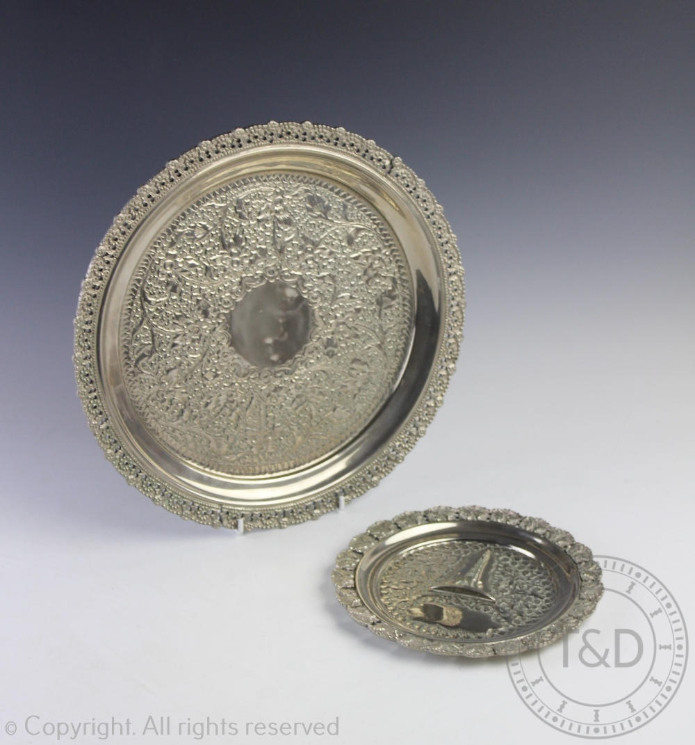 An Indian white metal circular salver stamped 'G.