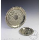 An Indian white metal circular salver stamped 'G.
