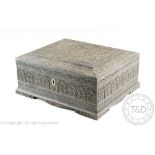 A late 19th century Ceylonese carved ebony box, decorated throughout with floral motifs,