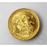 A George III gold sovereign dated 1820,