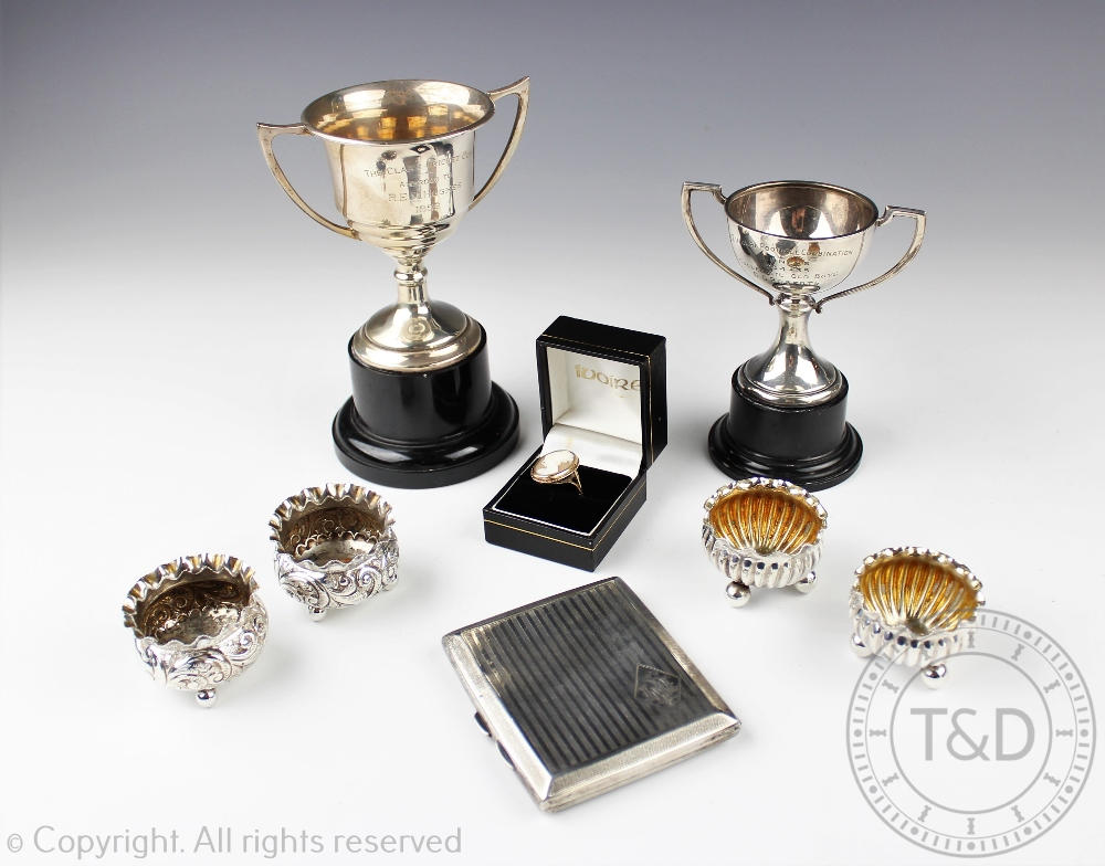 A collection of small silver to include; two silver trophy's,