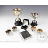 A collection of small silver to include; two silver trophy's,
