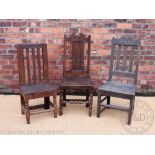Three assorted 18th century and later oak chairs comprising;