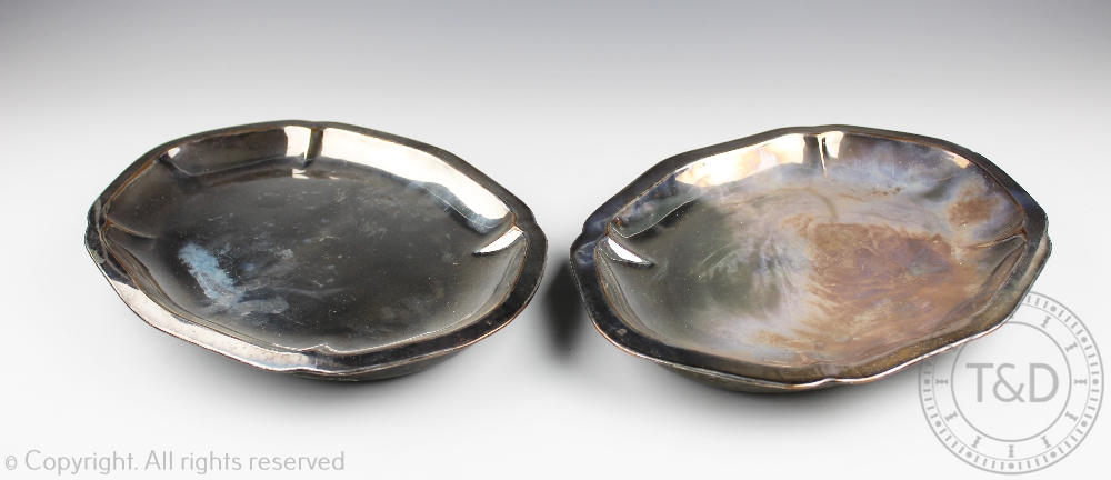 A pair of silver plated food warming dishes, 19th century, of oval cusped form,