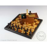 A Jaques Staunton pattern box wood and ebony chess set, the kings stamped 'Jaques London',