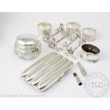 A collection of small silver and plate, to include; a silver cigar case Birmingham 1910, 4.