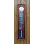 A mahogany cased Synchronome Electric wall clock, with Roman numeral dial - signed, and glazed door,