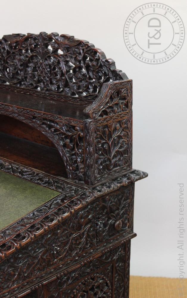 A late 19th century Anglo Indian / Burmese carved hardwood Davenport, - Image 9 of 9