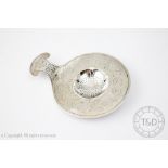 A George V silver strainer, 'The Duchess of Sutherland's Cripples Guild', Birmingham 1912,