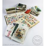 Two stamp albums titled 'Improved postage stamp album' and ' World-wide stamp album' containing an