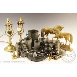 A collection of 19th century and later pewter and brass wares,