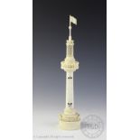 A 19th century carved ivory thermometer, modelled as a pierced tower with flag finial,