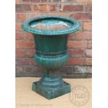 A green glazed garden jardiniere, of 19th century style,