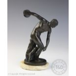 A 19th century French bronze figure of a discus thrower after the antique, on oval marble base,