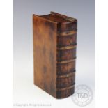 A 19th / early 20th century carved treen table snuff box in the form of a book, 16.