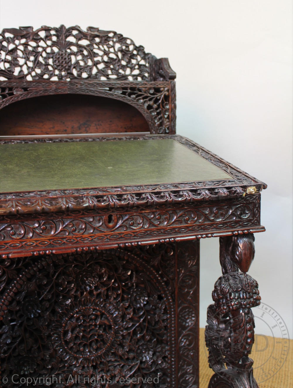 A late 19th century Anglo Indian / Burmese carved hardwood Davenport, - Image 6 of 9