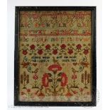 A Victorian needle work sampler by Alberta Wisick aged 14, dated February 6th 1888,