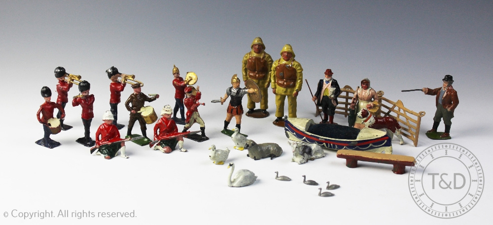 A collection of Britains cold painted lead figures to include two RNLI Crewman,