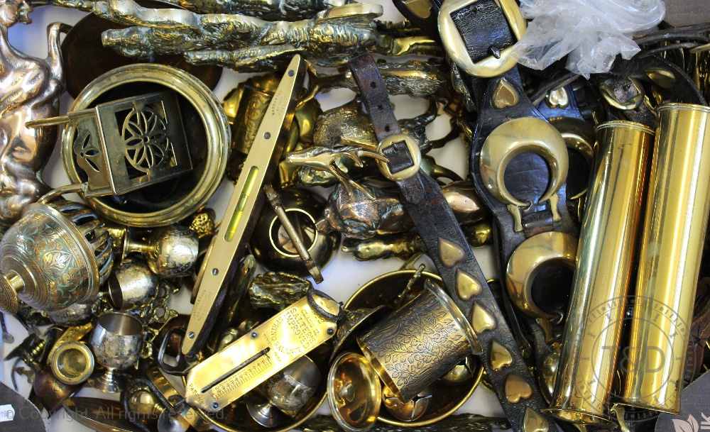 A quantity of brass wares, to include; taps, WWII shell cases,