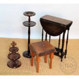 A 19th century style walnut spool stand, 39cm high, an oak drop leaf table on spindle legs,