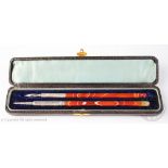 A Victorian banded agate handled dip pen with silver mounts 14.8cm long and a similar pencil 16.