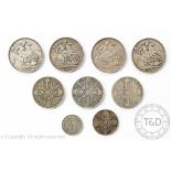 A collection of George III and later silver coins, comprising a George III crown 1820,