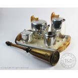 A Picquot Ware stainless steel five piece tea and coffee service, inclusive of tray,