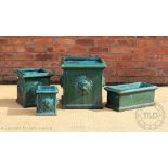 A Chinese green glazed garden planter, decorated with lion masks, 45cm H x 43cm W,