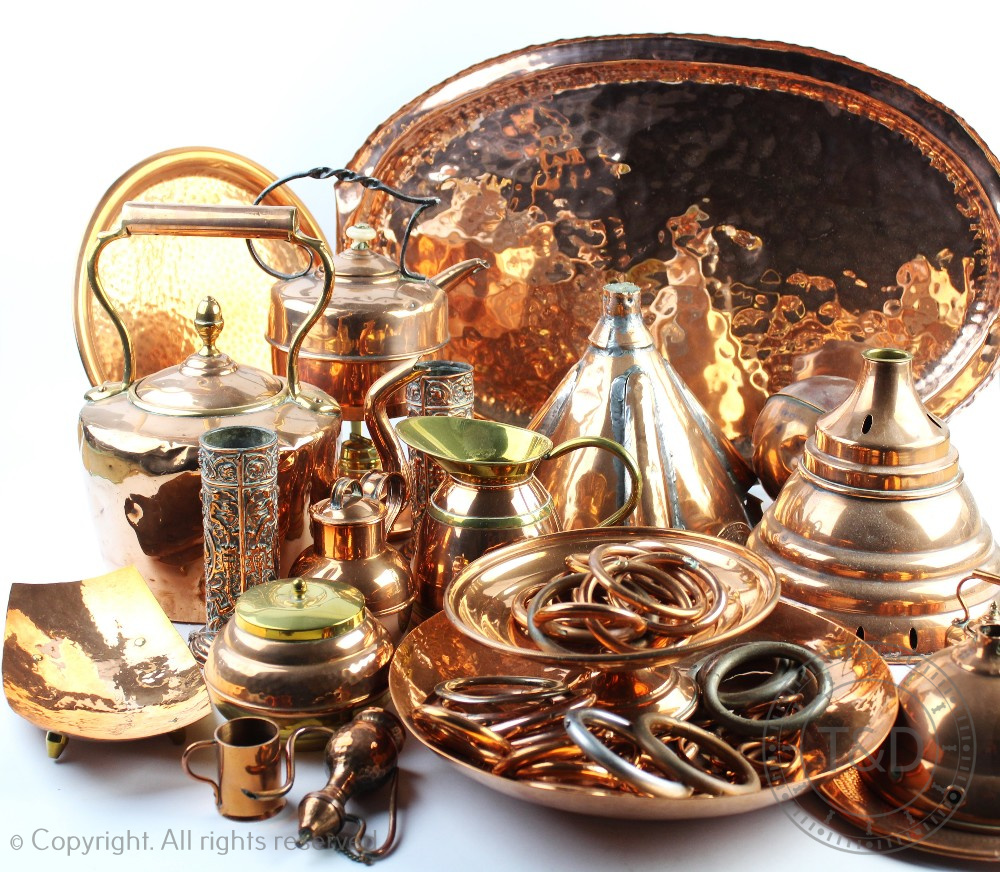 A large assortment of 19th century and later copper wares, to include; a large oval tray,