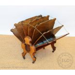 A Victorian inlaid walnut folding fan shaped Canterbury, with brass handle,