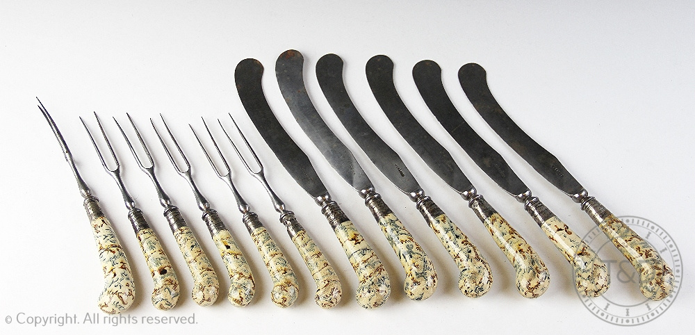 Twelve 18th century two-tine steel forks and knives,