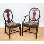 A set of six Hepplewhite style mahogany dining chairs, circa 1900,