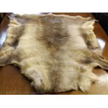 Two reindeer skin fur rugs / throws