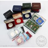 A collection of eight Royal Mint silver proof New Zealand one Dollar coins, in various boxes,