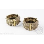 A pair of Bedouin tribal hinged bracelets, probably Sur, each of two tier form,