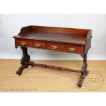 A Victorian mahogany side table, with three quarter back above two drawers,