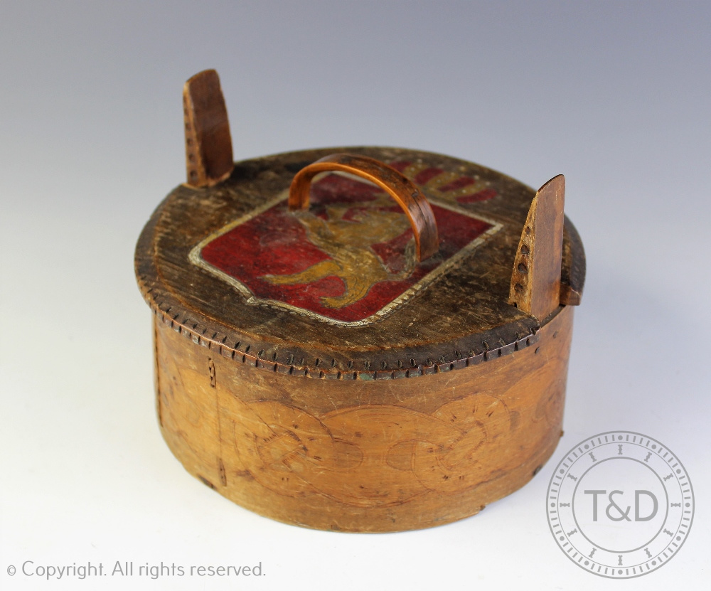 A Norwegian early 20th century Folk Art box and cover with heraldic detail,