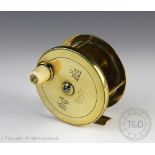 A 19th century brass fishing reel, the 9.